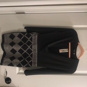 Sexy black deep V neck mini dress.